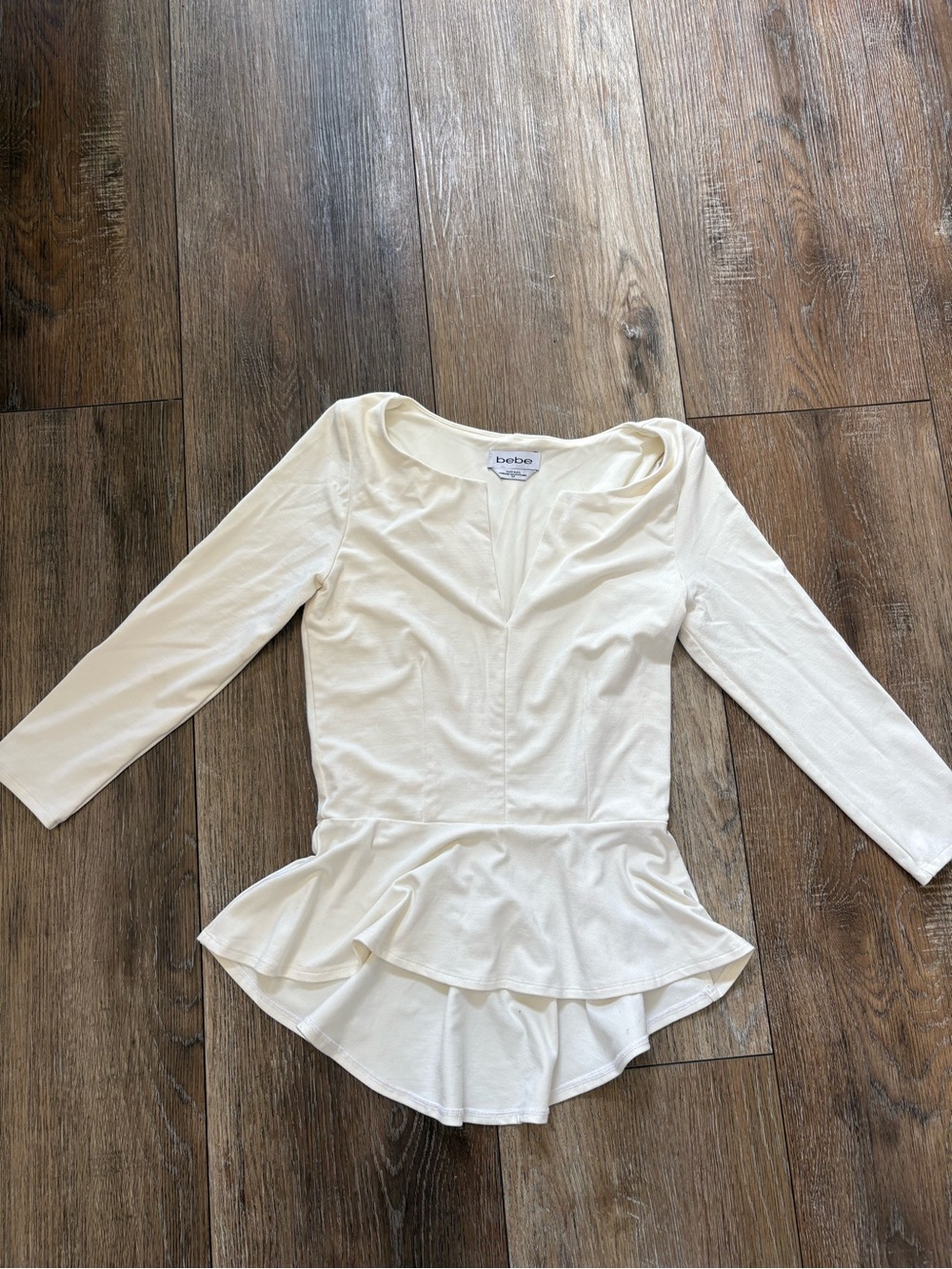 bebe Cream Peplum Long-Sleeve Tunic Top bandage stretch small